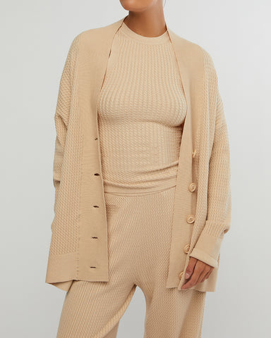 Oversized Cardigan by WeWoreWhat | oversized cardigan is made from cozy cable knit with drop shoulders and ribbed trimming. Relaxed fit Button-down | Alene Too located in Boca 
